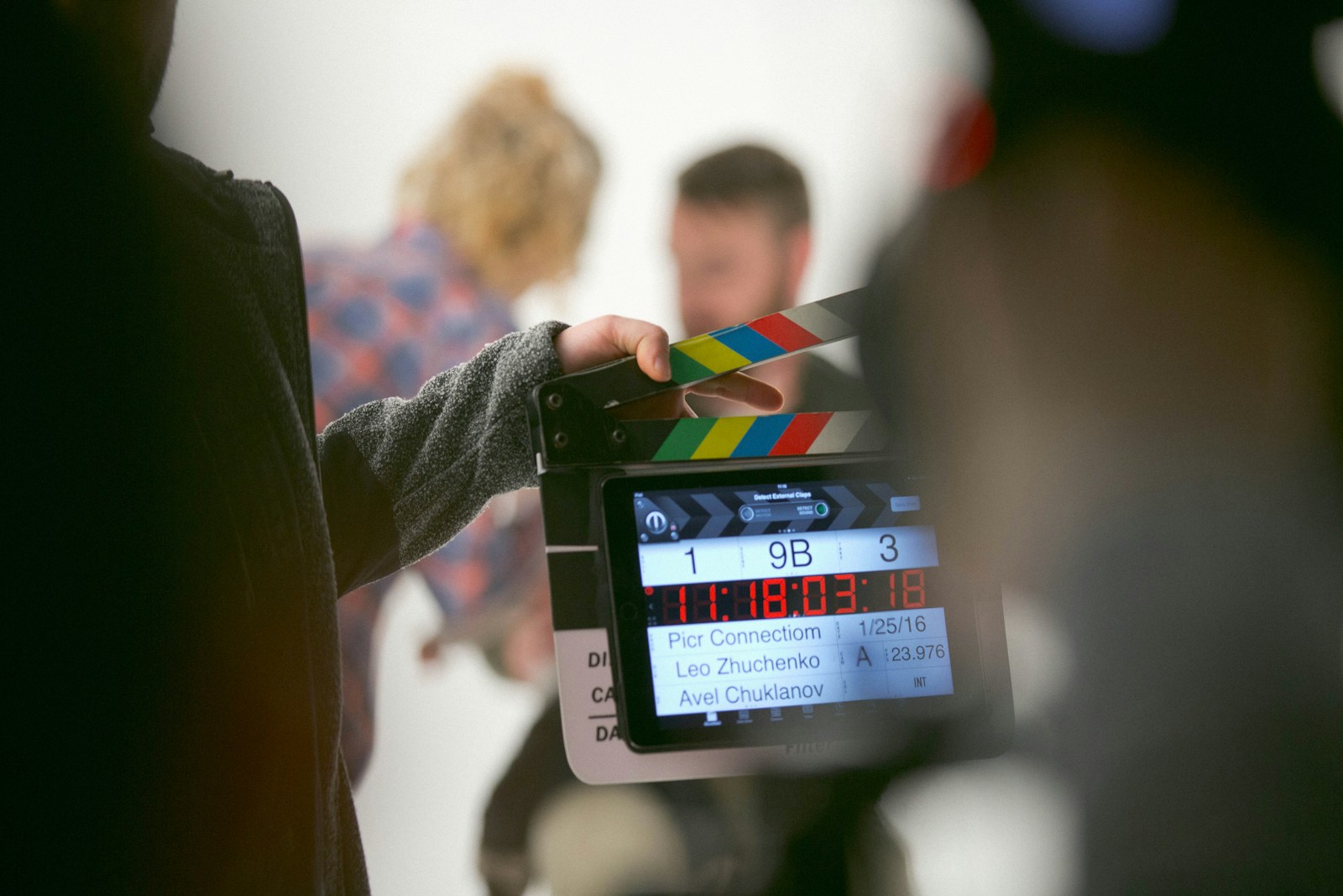 Film production setup on set, illustrating the work affected by production decisions.